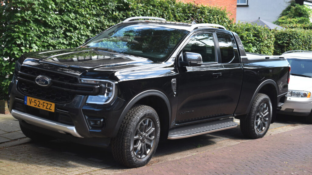 black 2024 Ford Ranger pickup truck street parked in the Netherlands