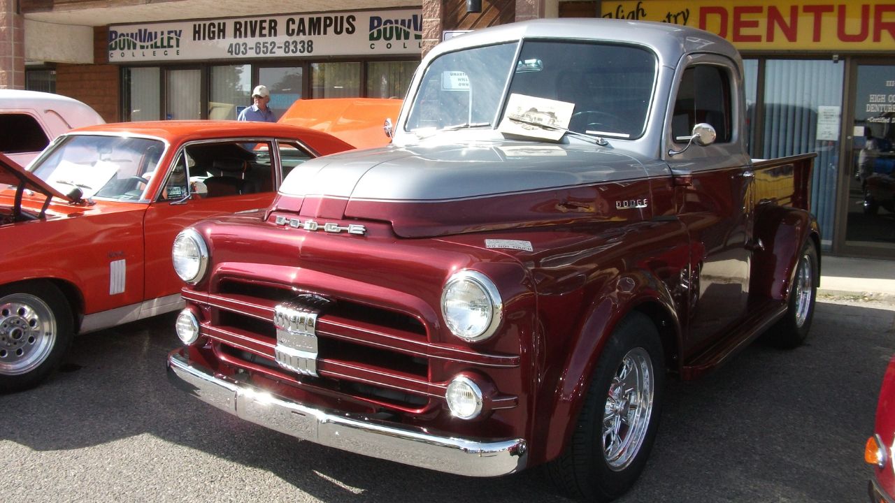 1952 Dodge truck with two tone paint and chrome rims.