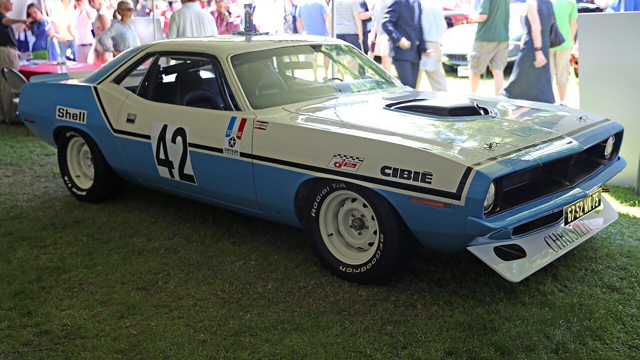 1970 Plymouth Hemi Cuda at the 2013 Greenwich Concours d'Elegance. This was raced until 1975 in France, originally by Ecurie Chrysler France as a works car, and is "the most decorated 'Cuda ever"