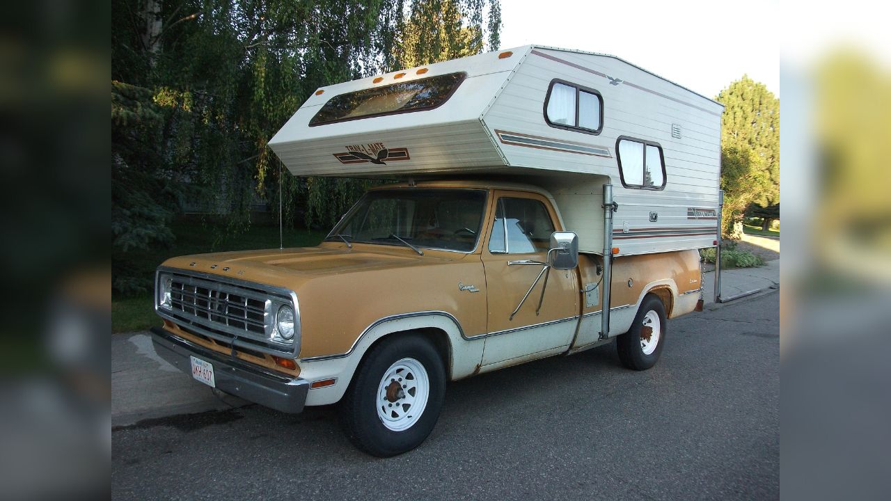 1974 Dodge D200 pickup truck with camper