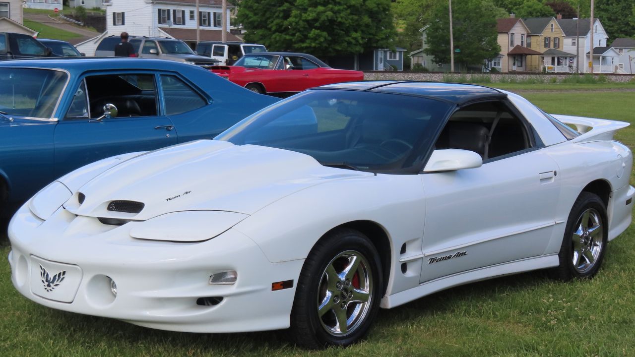 1998 Pontiac Firebird Trans Am coupe, front left, 05-26-2025
