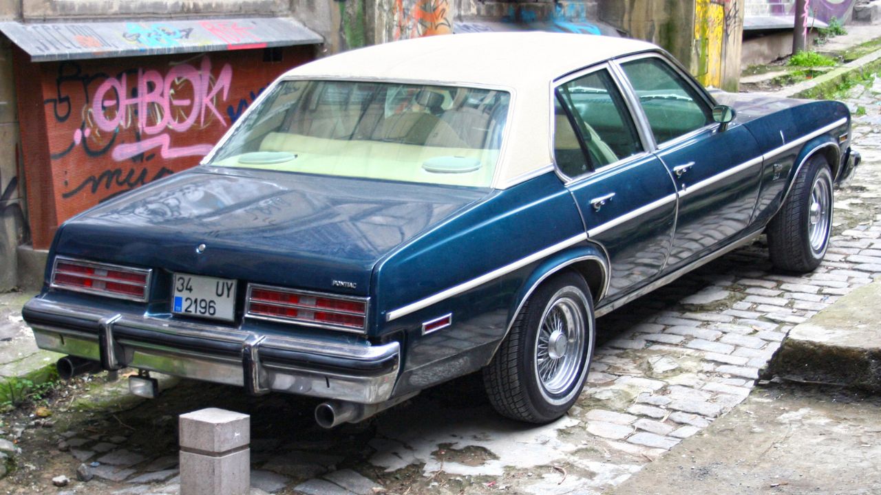 Rear view of a much photographed Pontiac Ventura SJ sedan near the Galata Tower, Istanbul