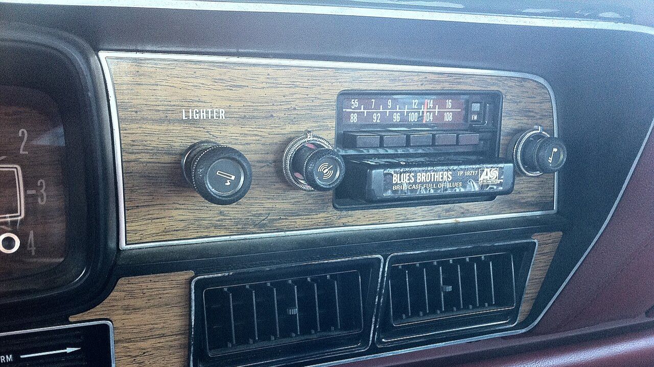 Why did so many cars come with cigarette lighters?