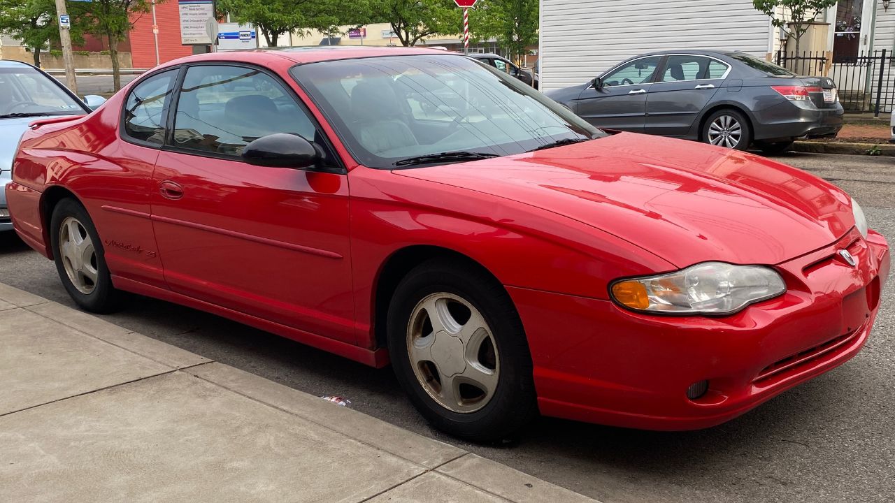 2000 Chevrolet Monte Carlo SS in Torch Red, front right, 05-20-2022