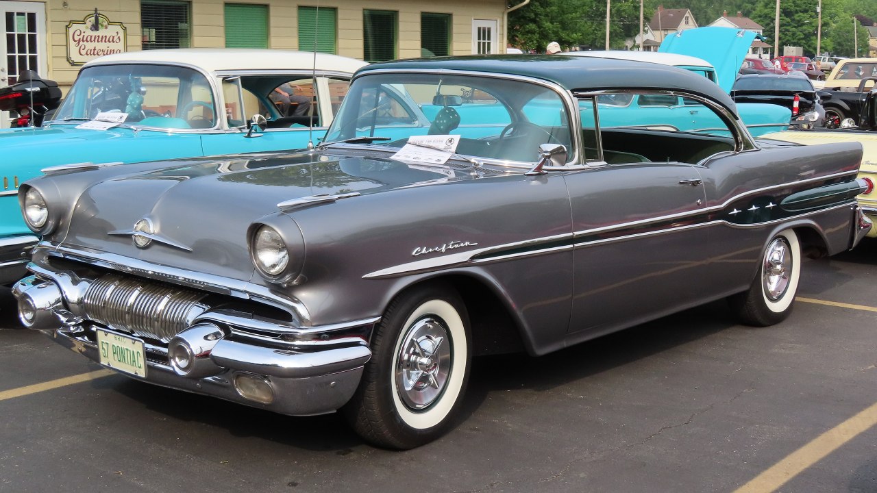 Why did old cars use hidden fuel filler doors?