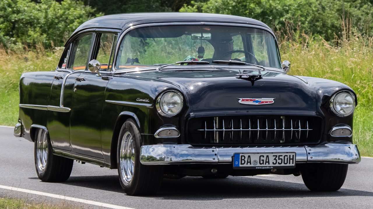 Why did automakers offer chrome bumper guards?