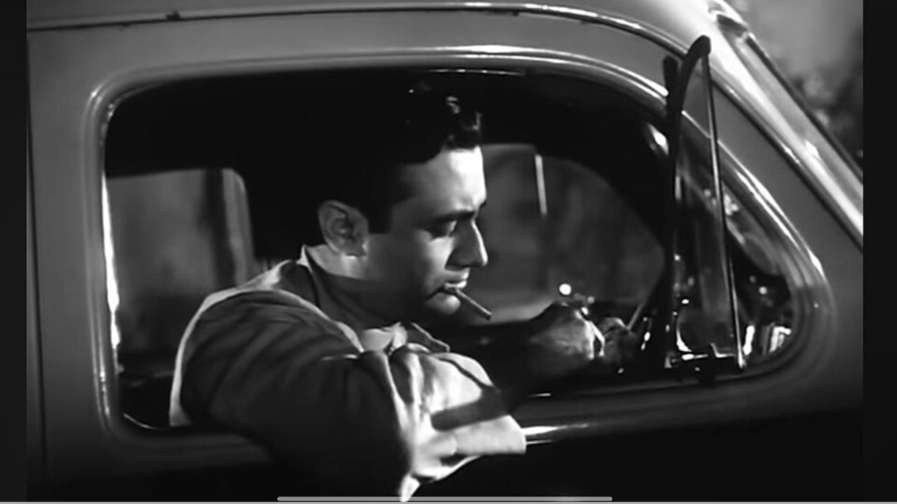 Drives a car while smoking