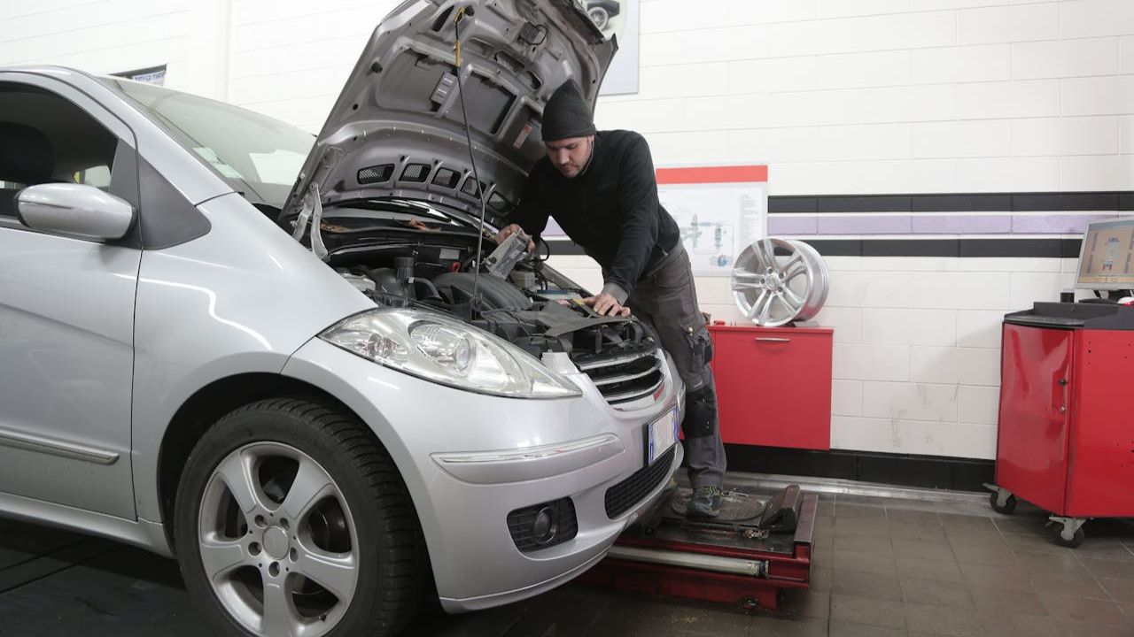 Man Checking his Car