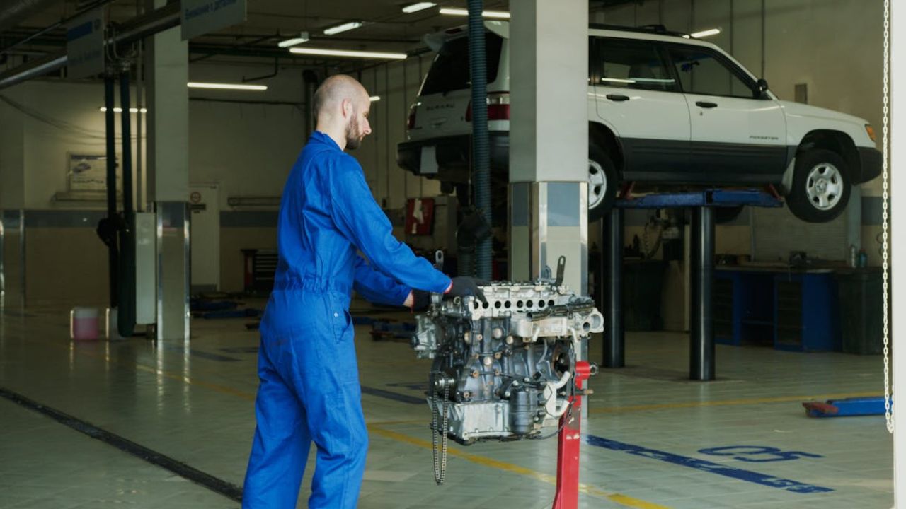 Mechanic Checking Engine