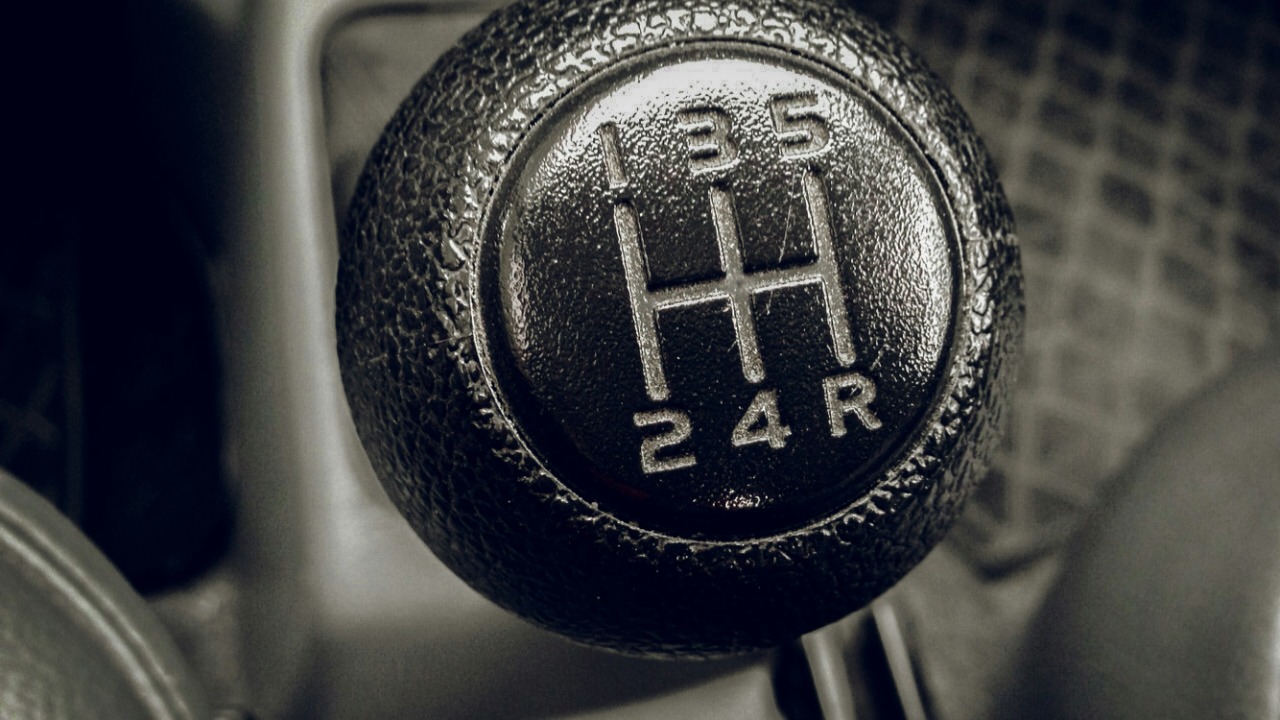 a close up of a car's gear stick