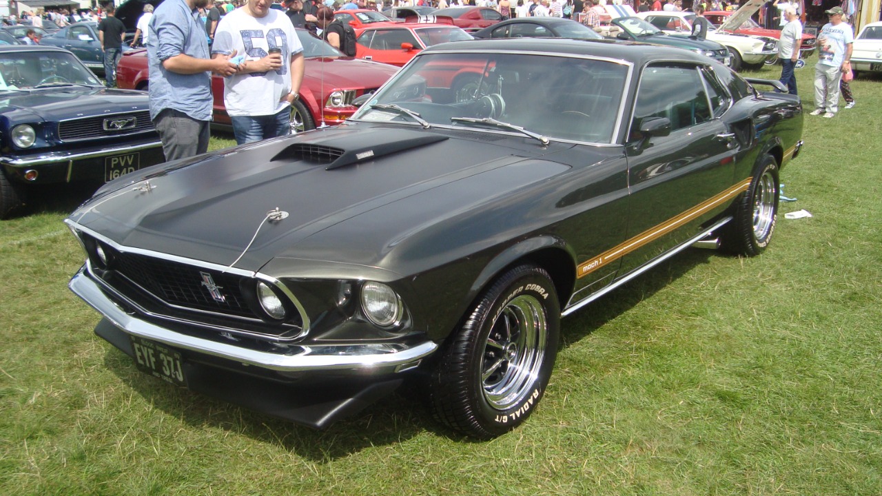 The 1969 Ford Mustang Mach 1 gained popularity but struggled against rising insurance costs