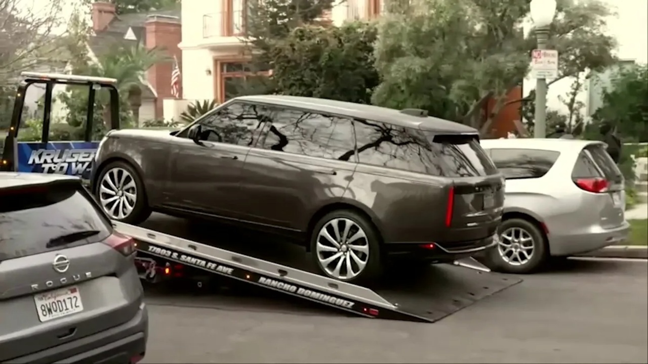 Range Rover yanked from LA mansion in shocking $ fraud probe