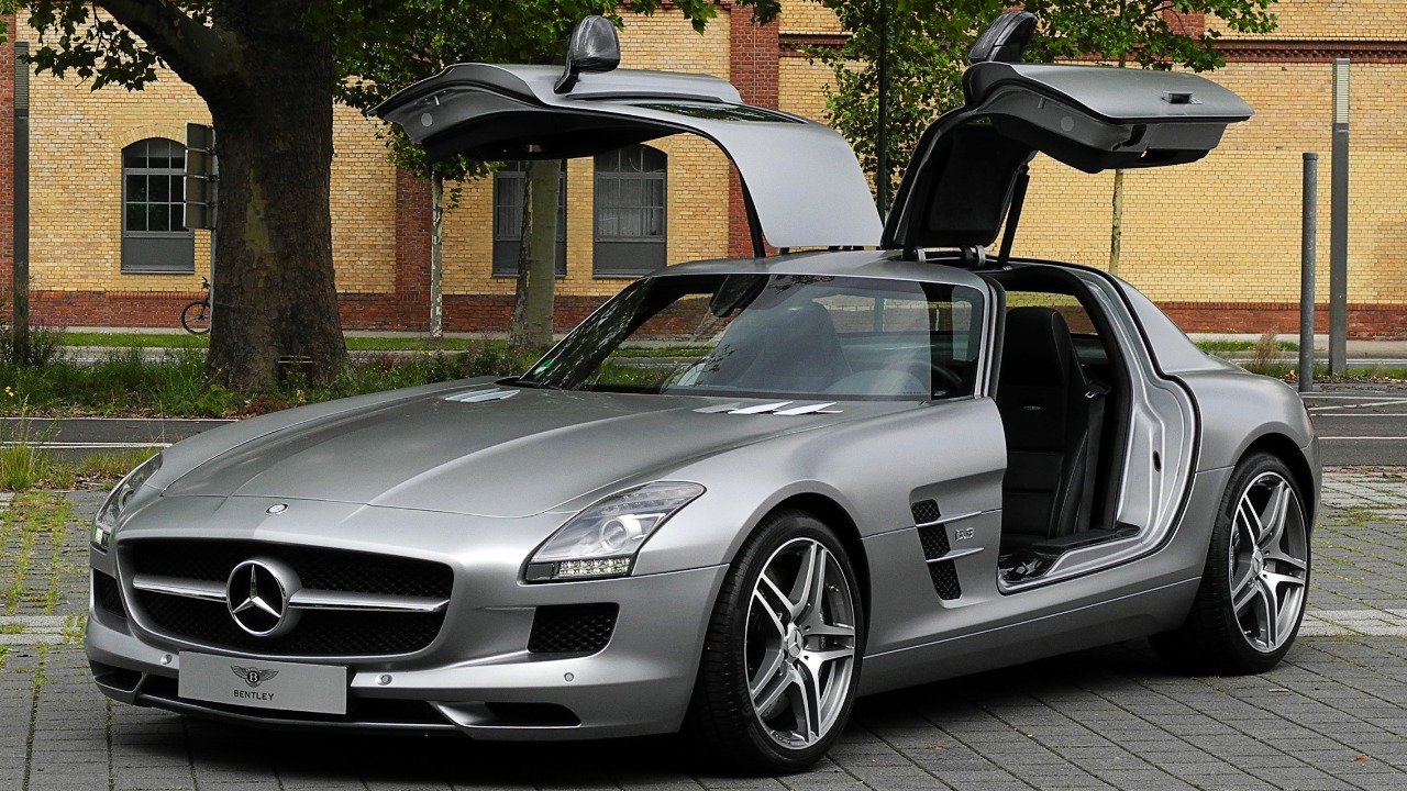A Mercedes-Benz SLS AMG with its gullwing doors open