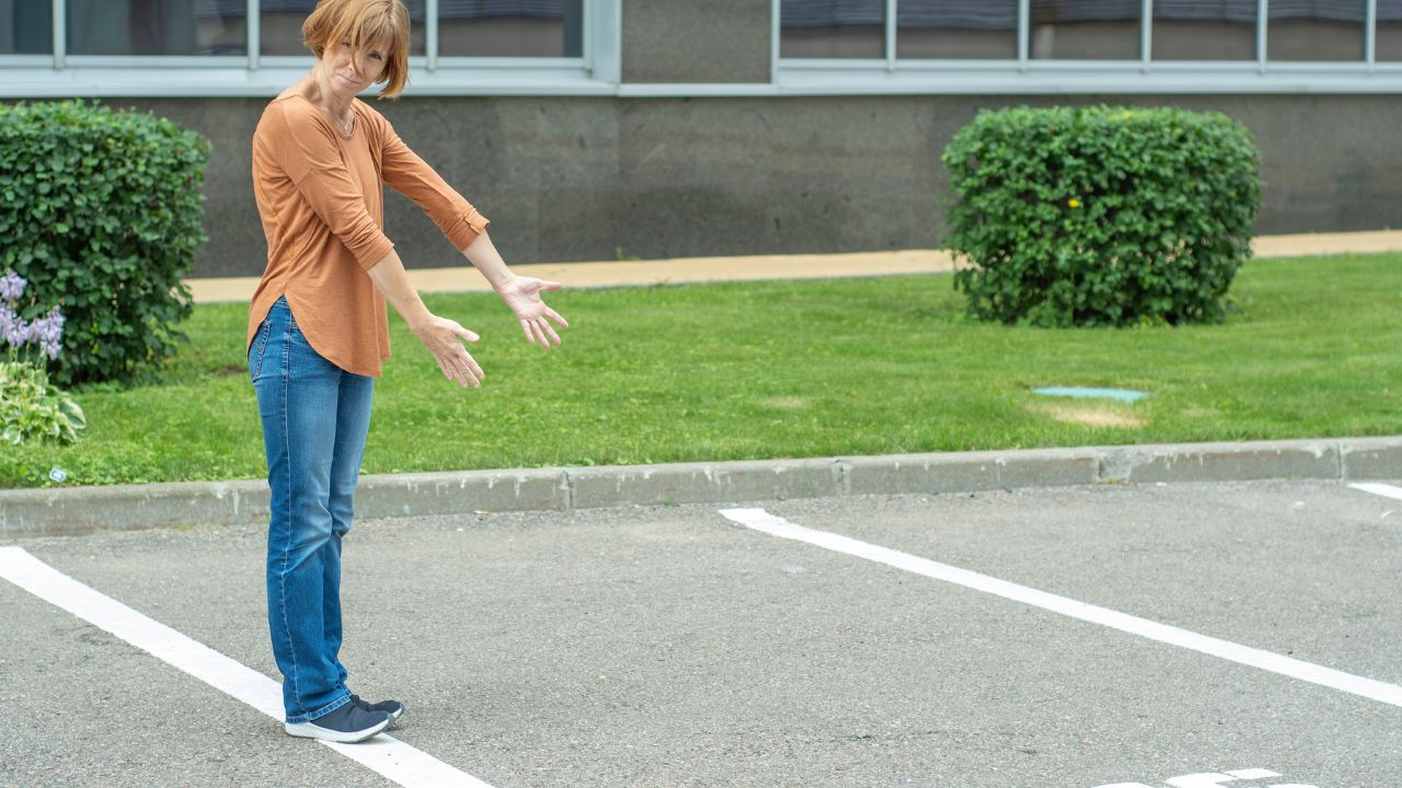 Owner says her parking spot was towed even though her permit was clearly visible