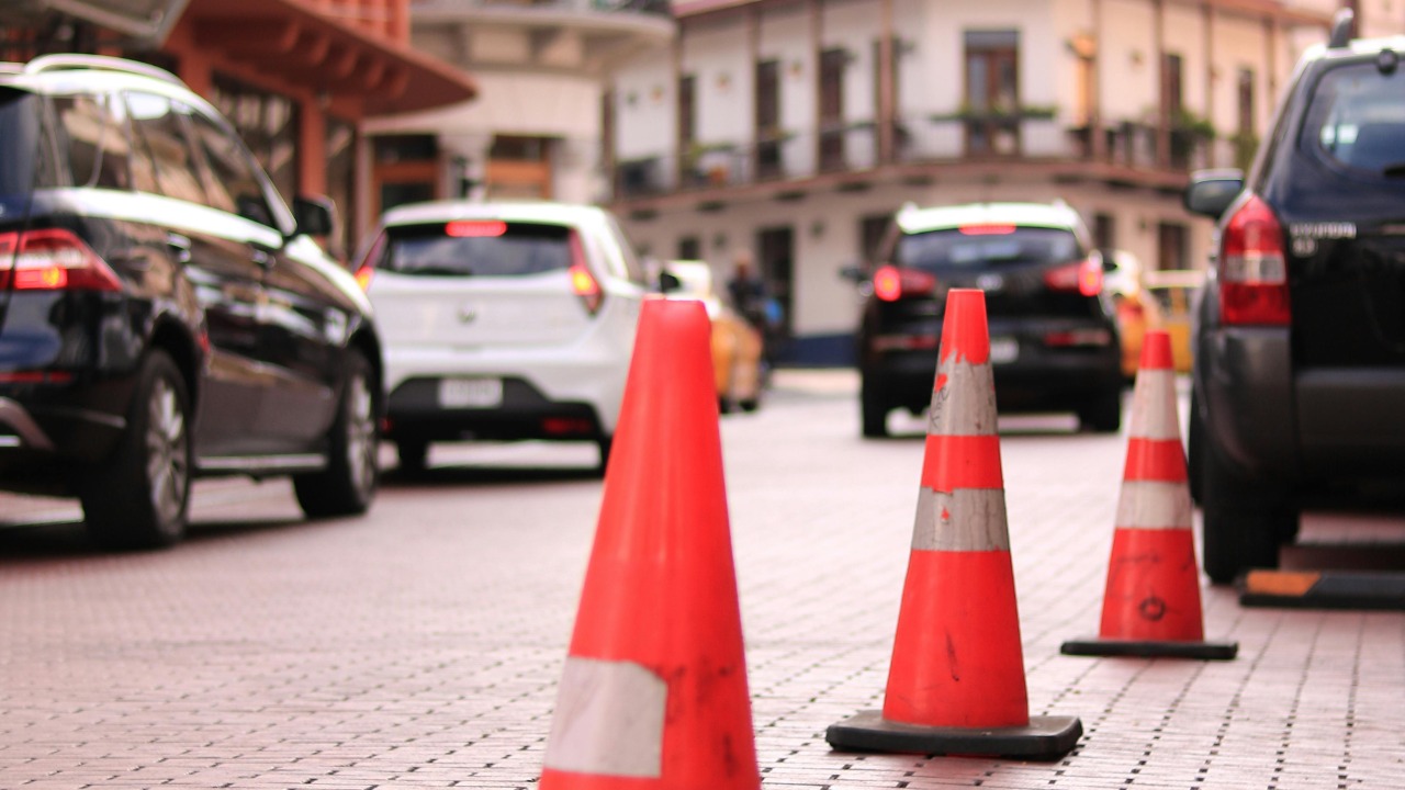 A stranger keeps reserving street parking with cones and says everyone does it