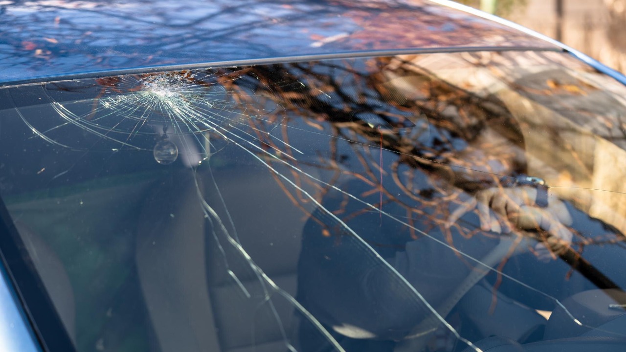 My car wash visit ended with a cracked windshield and a manager who blamed “road debris”