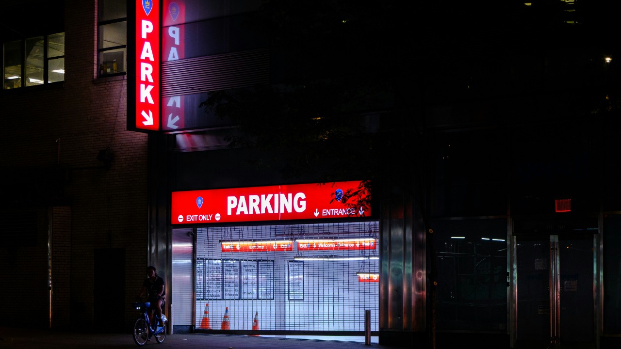 Driver says the parking garage charged an overnight fee even though he left before midnight