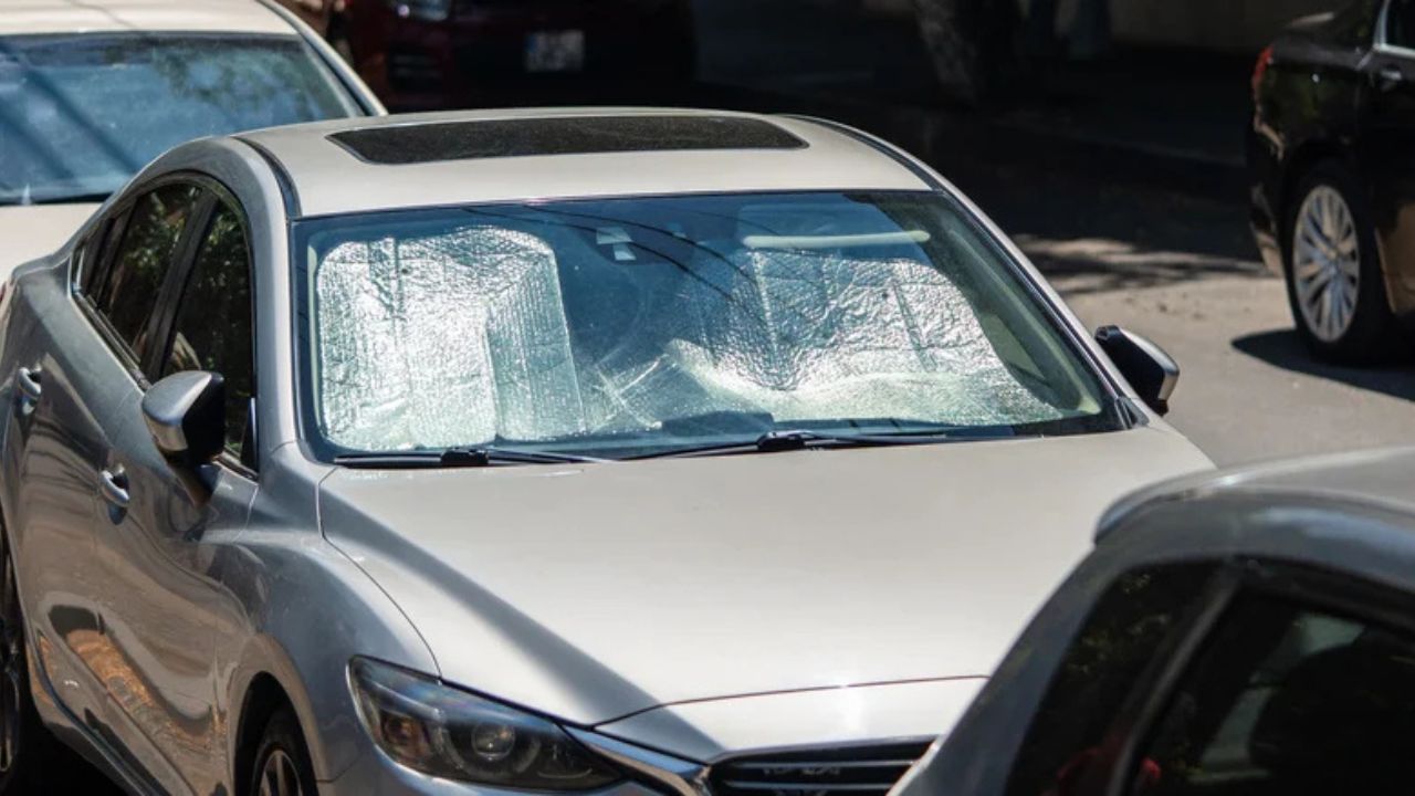 A $10 sunshade could cut a/c load and improve fuel economy in hot weather