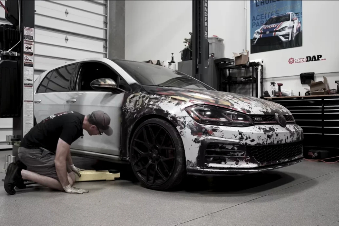 Shop left stunned after ~$40K VW Golf GTI arrives coated in rattle-can paint and white coolant crust