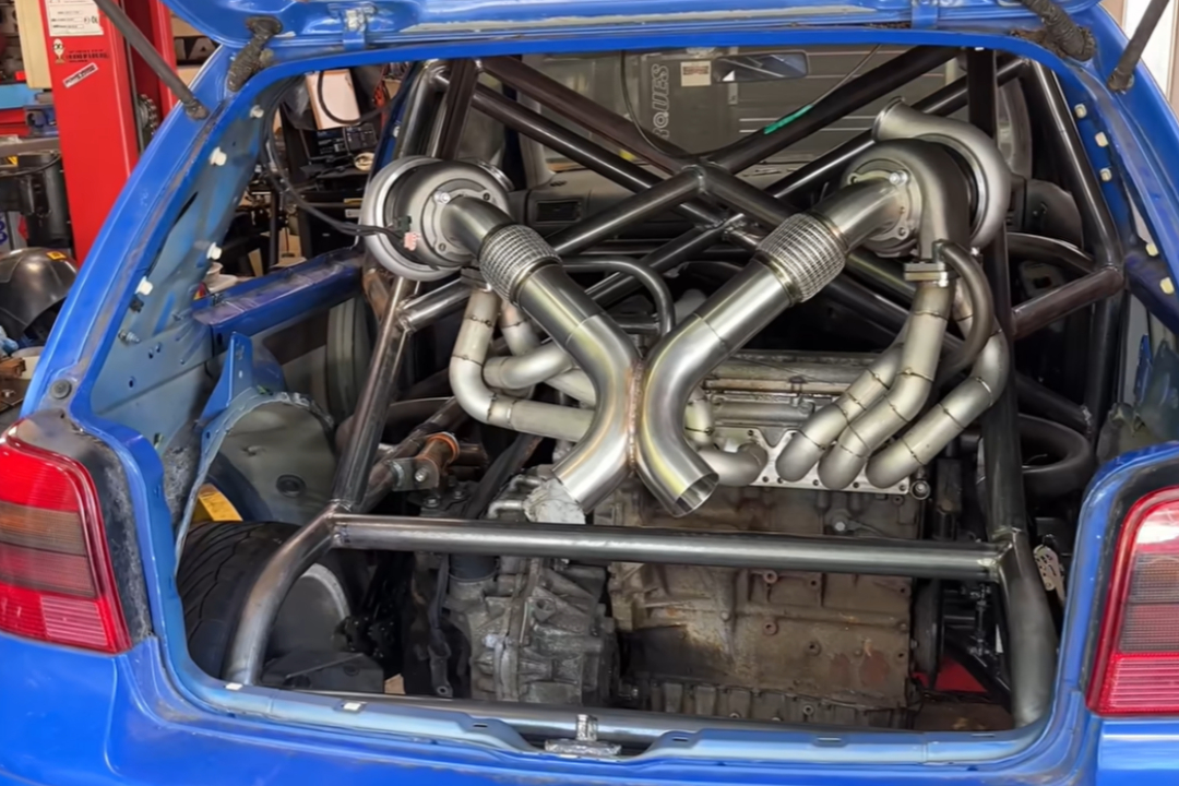Dad fits twin turbos to a mid-engined Mk4 golf wreck because his son asked for 1,000 HP