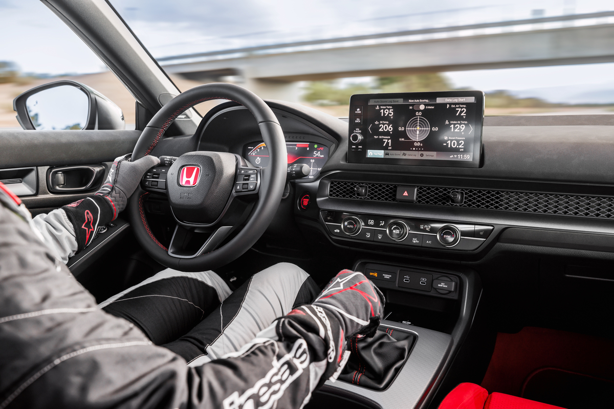 Driver shifting the six-speed manual in the 2027 Civic Type R