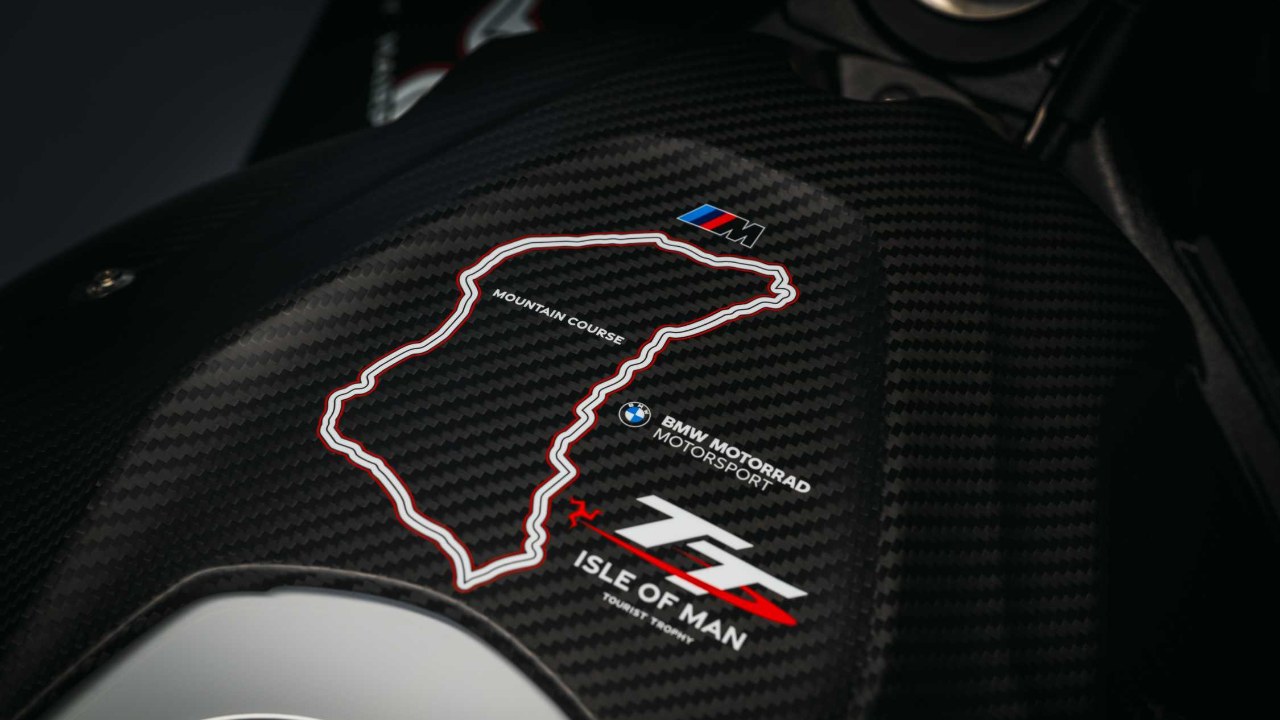 Carbon airbox cover with Mountain Course graphic and TT logo