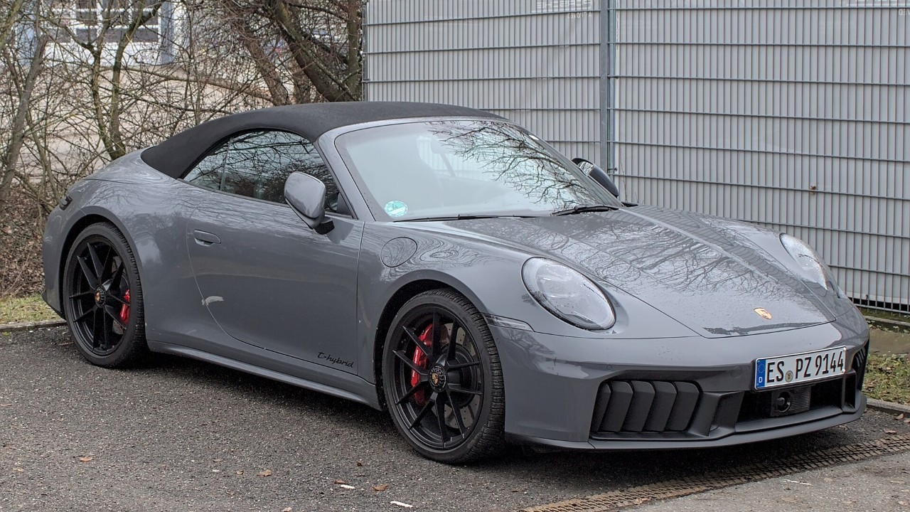 A Porsche 911 T-Hybrid cabriolet; the 911 Carrera GTS T-Hybrid is a 2026 Wards 10 Best Engines winner