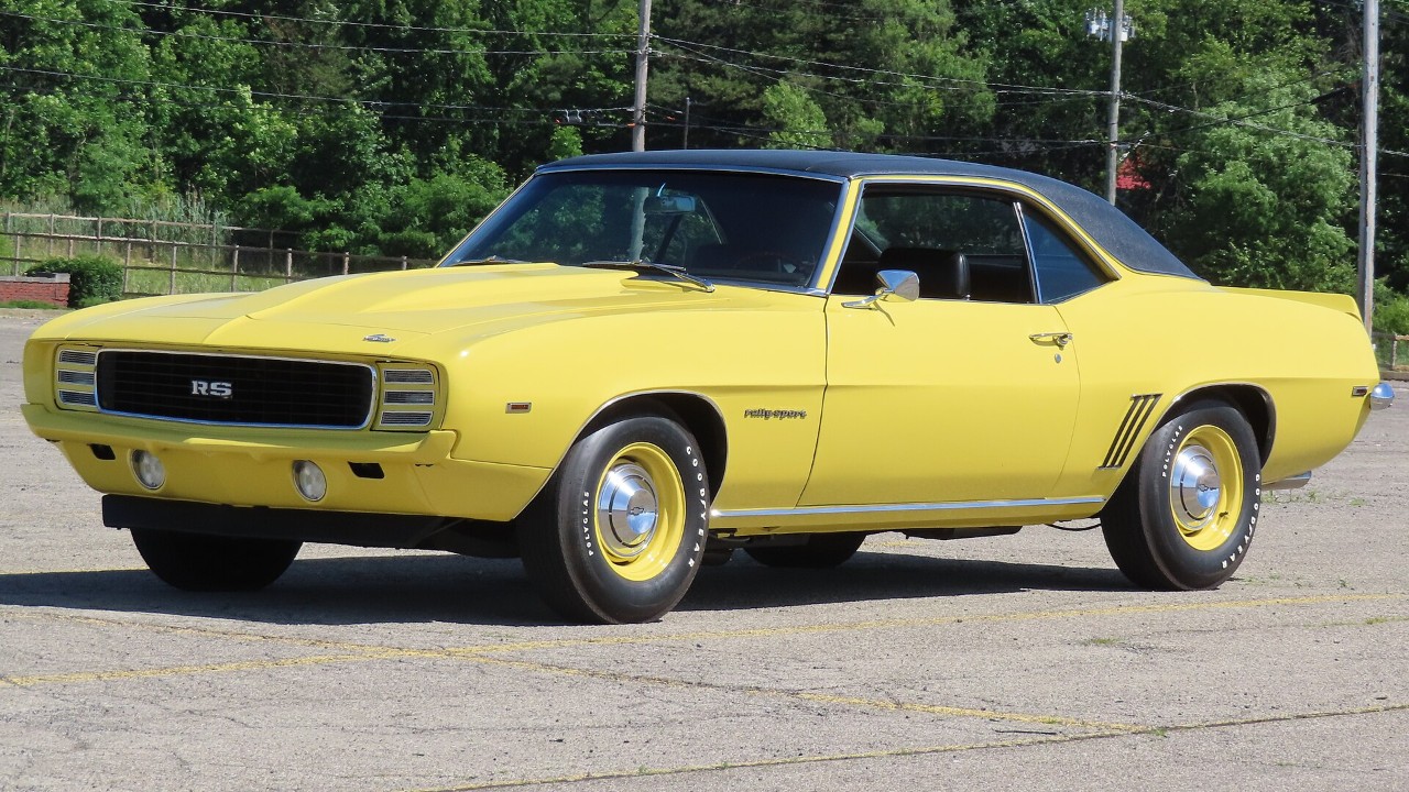 A 1969 Camaro Sport Coupe with Rally Sport equipment; the base 1969 Camaro engine was a 230 six