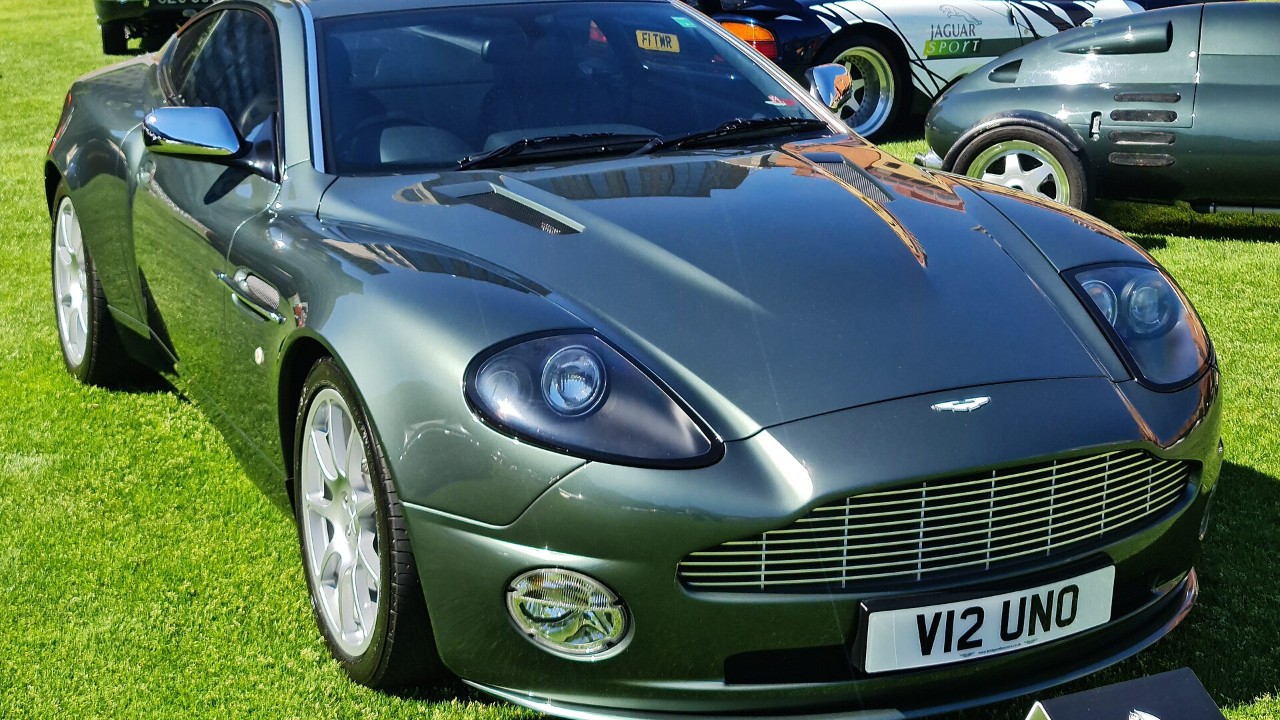 A silver 2002 Aston Martin V12 Vanquish