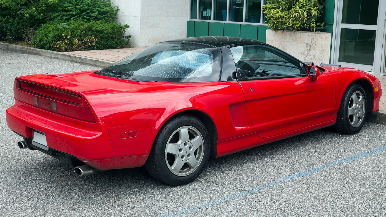 Rear view of a 1991 Acura NSX, whose NSX aluminum body was built around an all-aluminum monocoque
