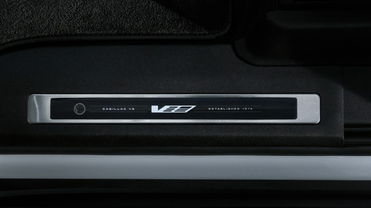 The illuminated sill plate of the 2027 Cadillac Escalade-V 125th Anniversary Collector Series