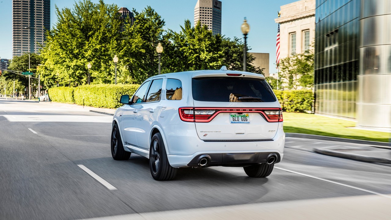 Rear view of a white Dodge Durango SRT showing its full-width racetrack taillamp