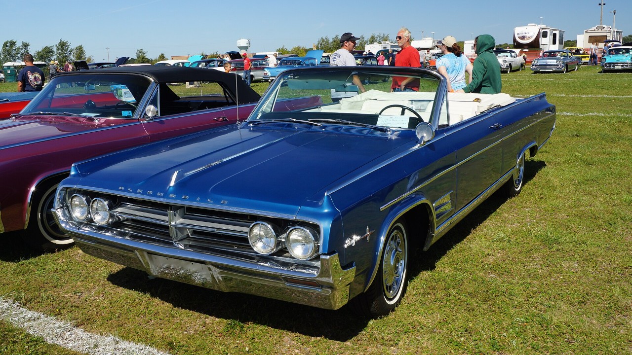A 1964 Oldsmobile Starfire convertible