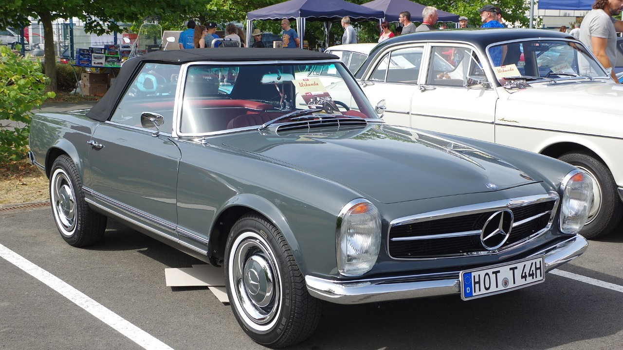 A Mercedes-Benz 230 SL with its pagoda hardtop