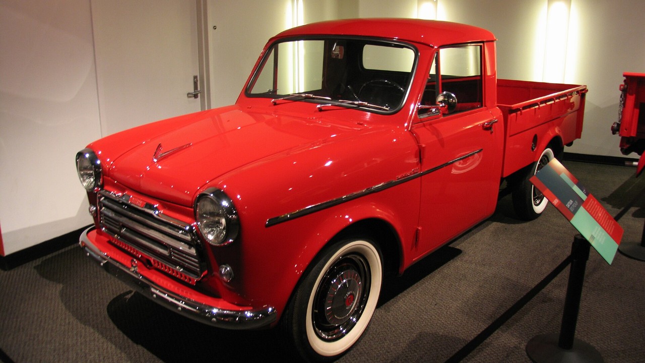 A red Datsun 220 pickup