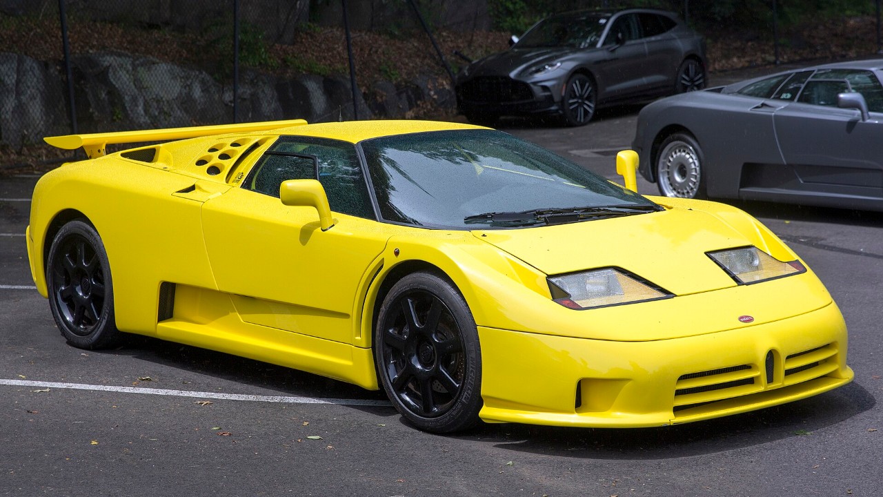 A yellow Bugatti EB110 Super Sport