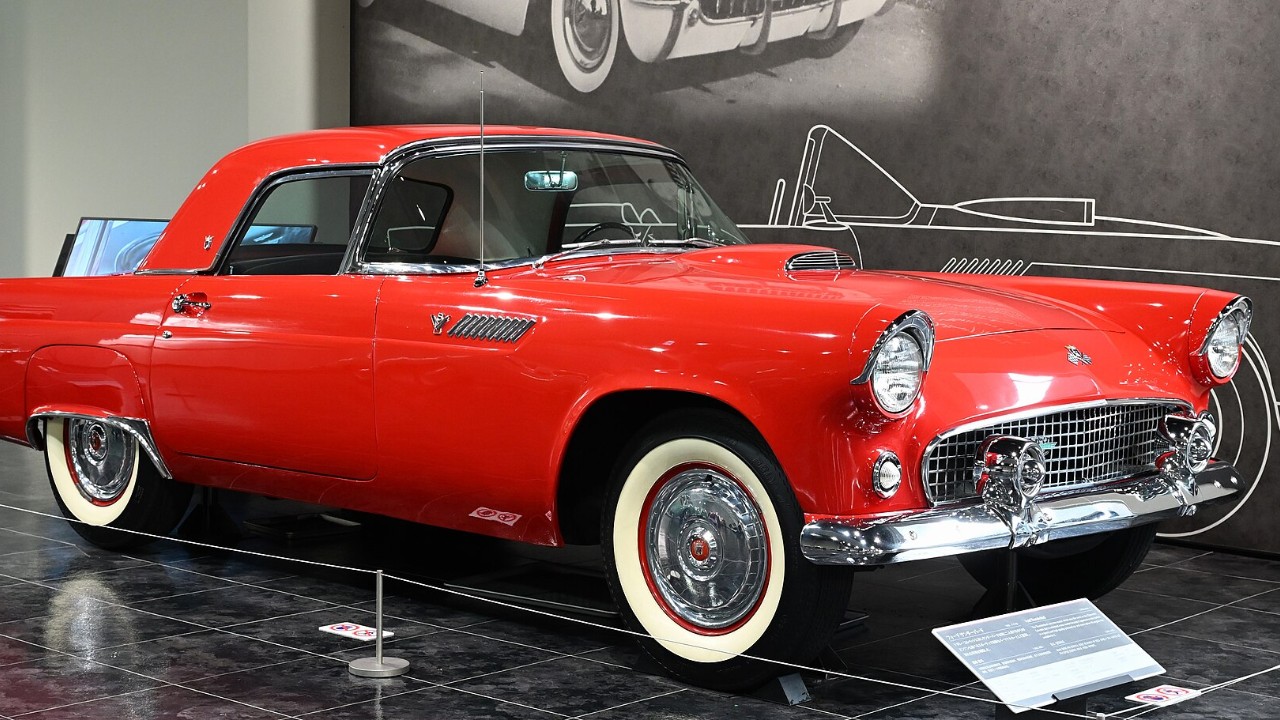 A red 1955 Ford Thunderbird