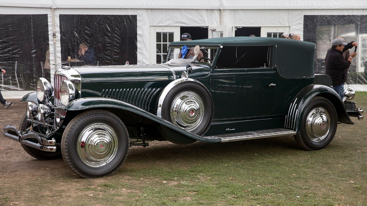 A 1931 Duesenberg Model J Convertible Victoria by Rollston