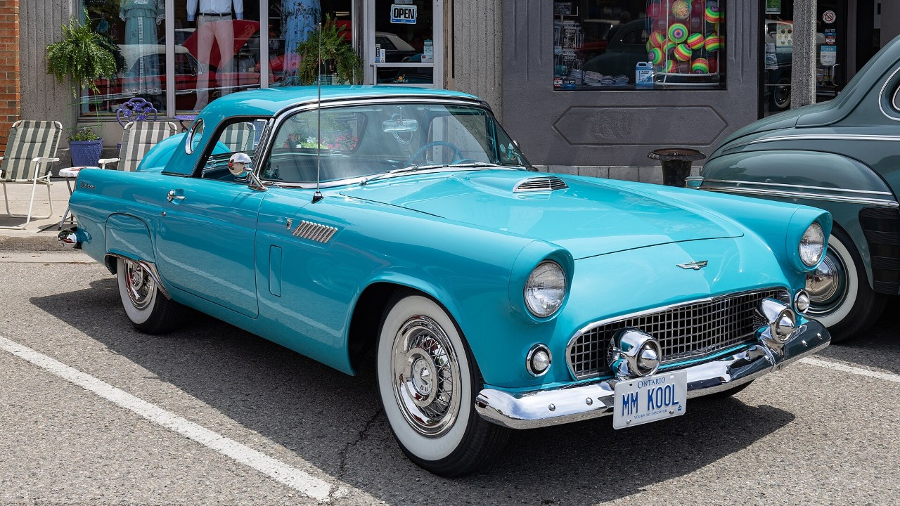 A turquoise 1956 Ford Thunderbird