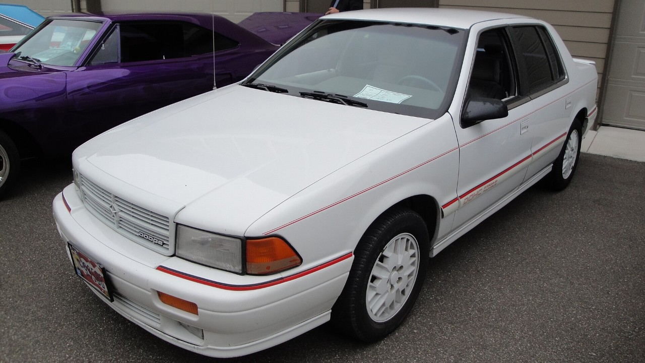 A white 1991 Dodge Spirit R/T