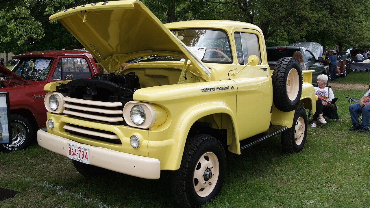A yellow 1958 Dodge W100 Power Wagon pickup
