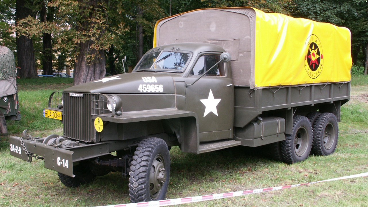 A Studebaker US6 military Studebaker truck with a canvas cargo cover