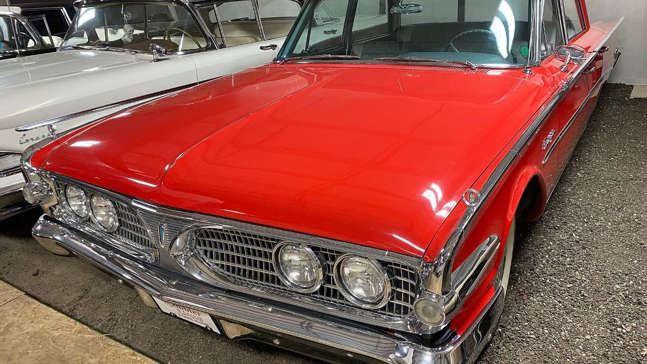 A red 1960 Edsel Ranger four-door sedan