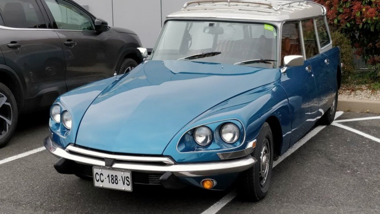 A blue U.S.-spec Citroën DS Break, a French car in America sold as the Station Wagon