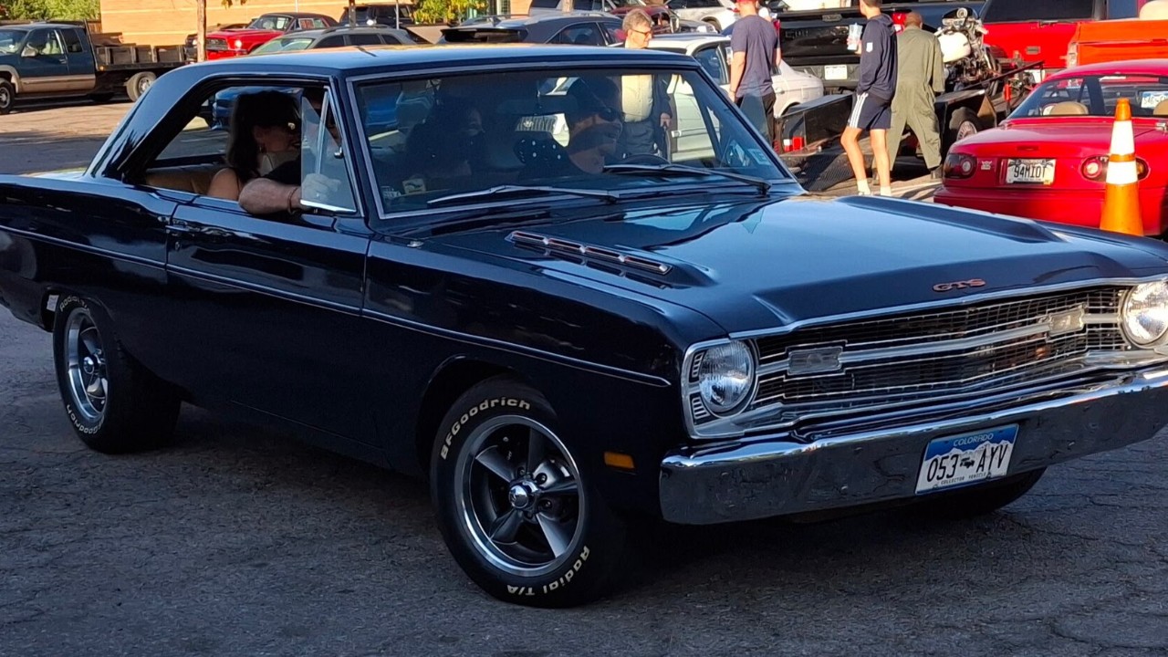 A black 1969 Dodge Dart GTS