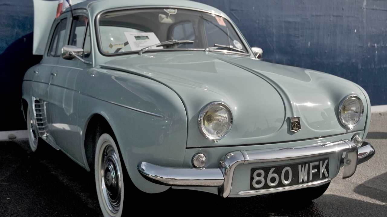 A pale grey Renault Dauphine, the car that led Renault in America