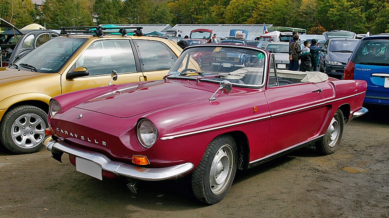 A red Renault Caravelle convertible