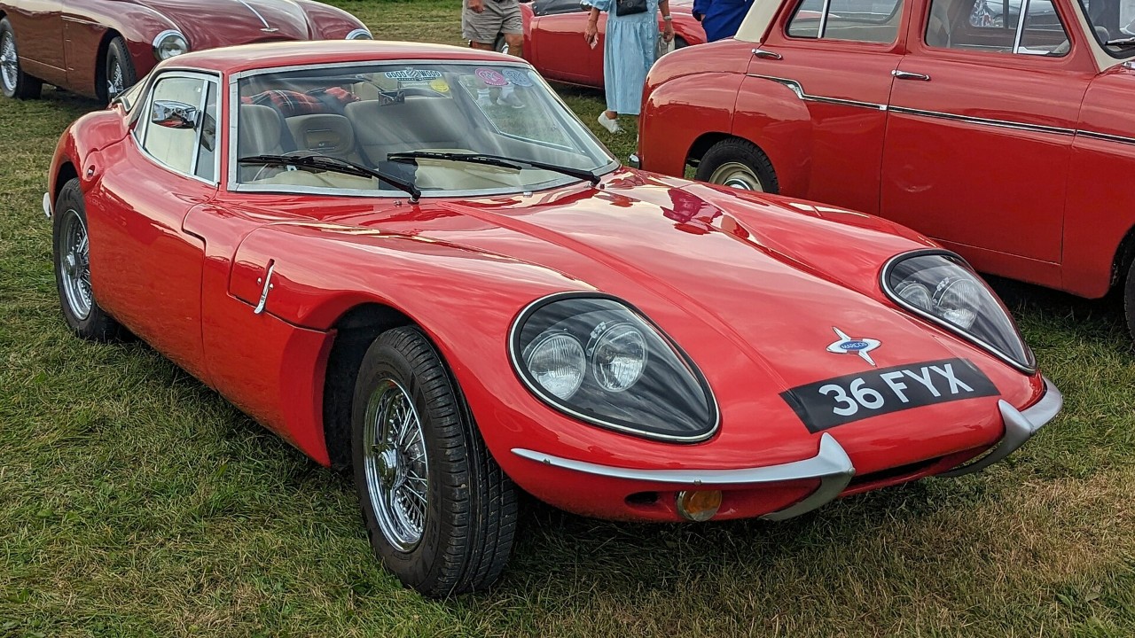 A red 1965 Marcos 1800 GT