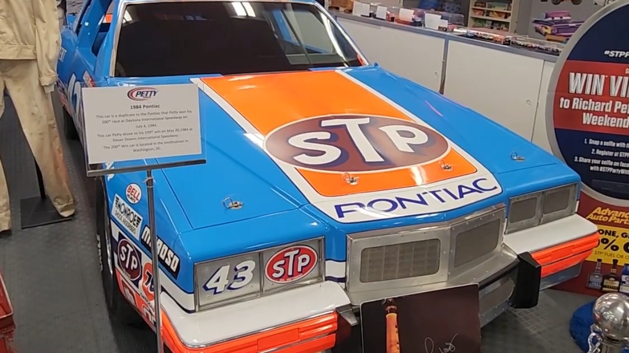 Richard Petty won his 200th race with President Reagan watching, and the car went to the Smithsonian that year