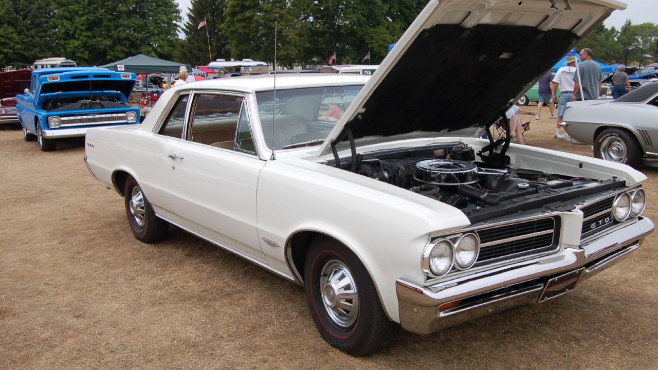 Pontiac GTO engine bay of a 1964 GTO with its hood up